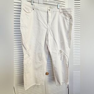 White oversized distressed jeans.